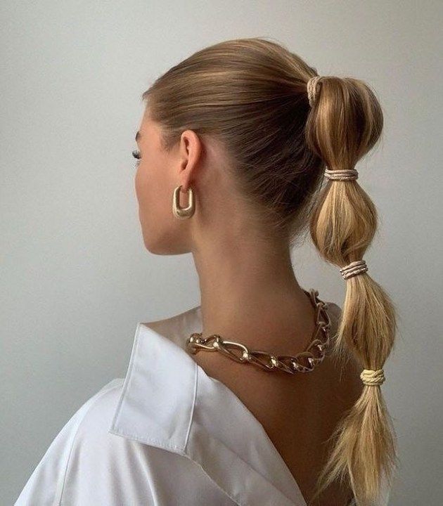 Create a Playful Bubble Ponytail for a Fun and Flirty Look