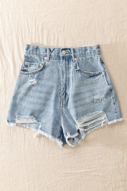 The Rise of High-Waist Distressed Denim Shorts: A Stylish Must-Have for Summer