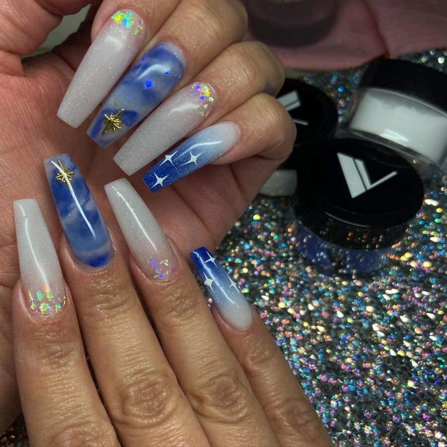 Galaxy-Inspired Glittery Nails
  Design