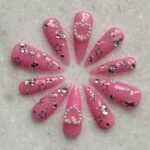 1688777186_Manicure-With-A-Tribal-Accent-Nail.jpg