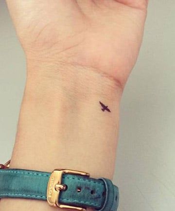Feathered Finesse: Trendy Bird Tattoo Designs for a Fashionable Look