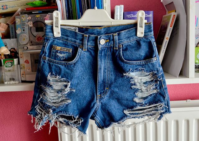 DIY Distressed Denim Shorts
  From Old Jeans