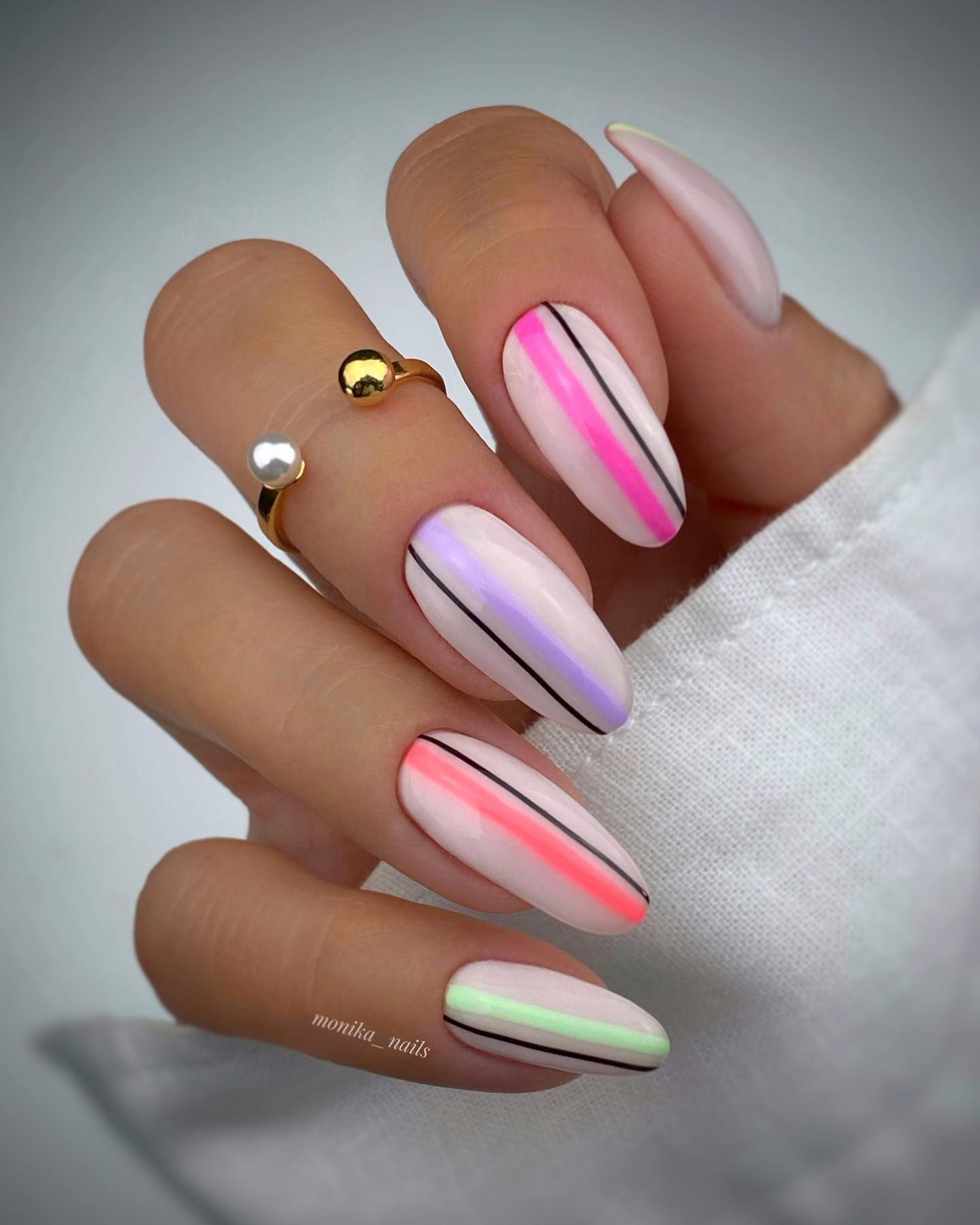 Geometric Gold Striped Nails