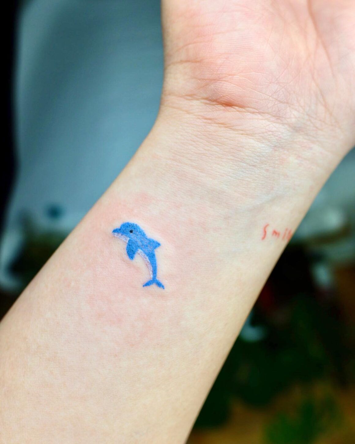 Dive into the World of Impactful Dolphin Tattoos for Men