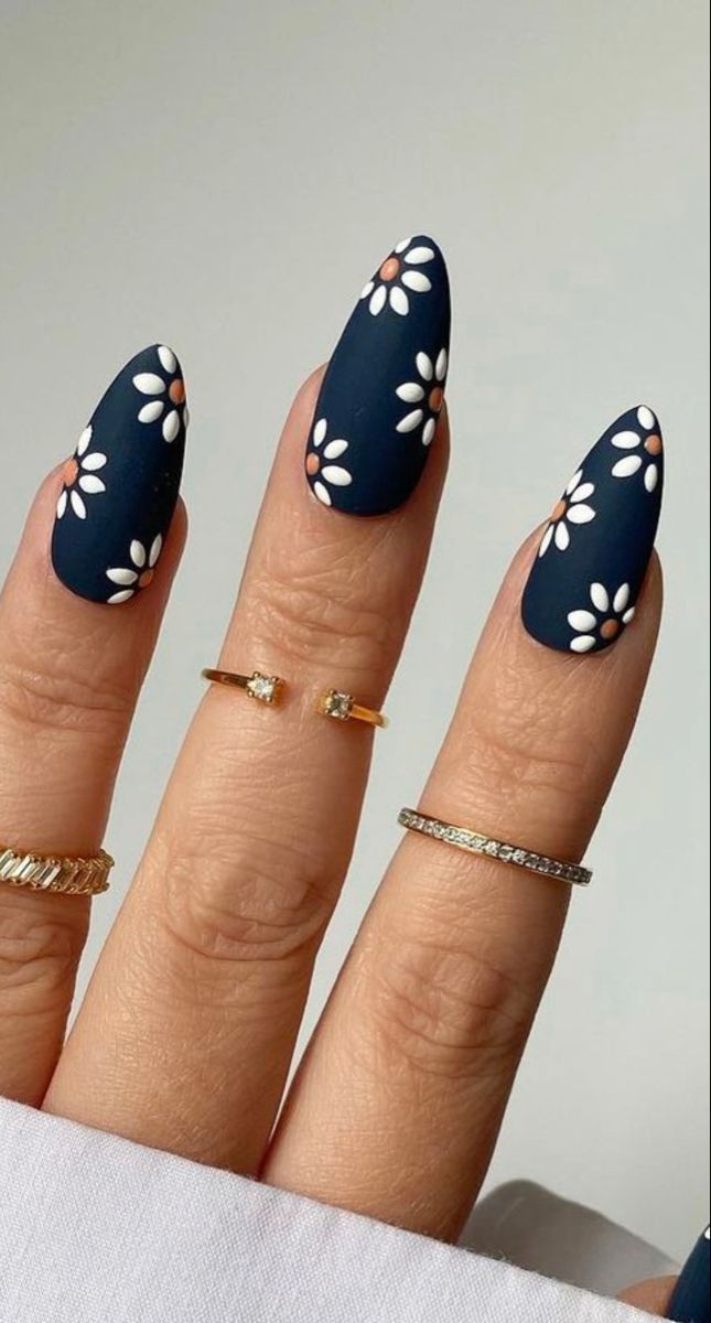 Floral-Inspired Nail Art: A Chic Twist with Metal Accents