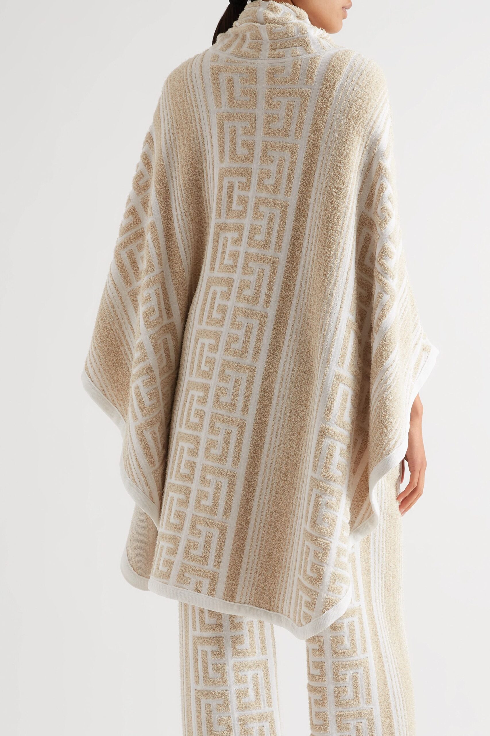 Stay Cozy and Stylish This Autumn with Knitted Ponchos