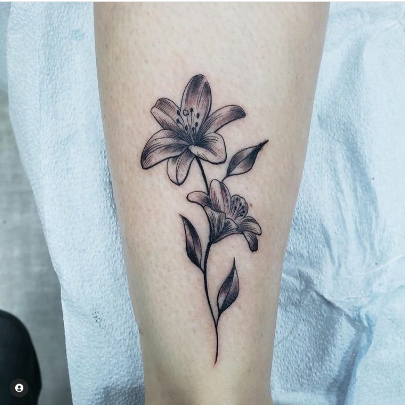 Blooming Beauty: Lily Tattoos that Inspire