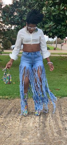 DIY Distressed Denim Shorts
  From Old Jeans